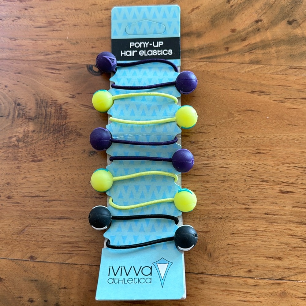 Ivivva zipper pulls/hair ties